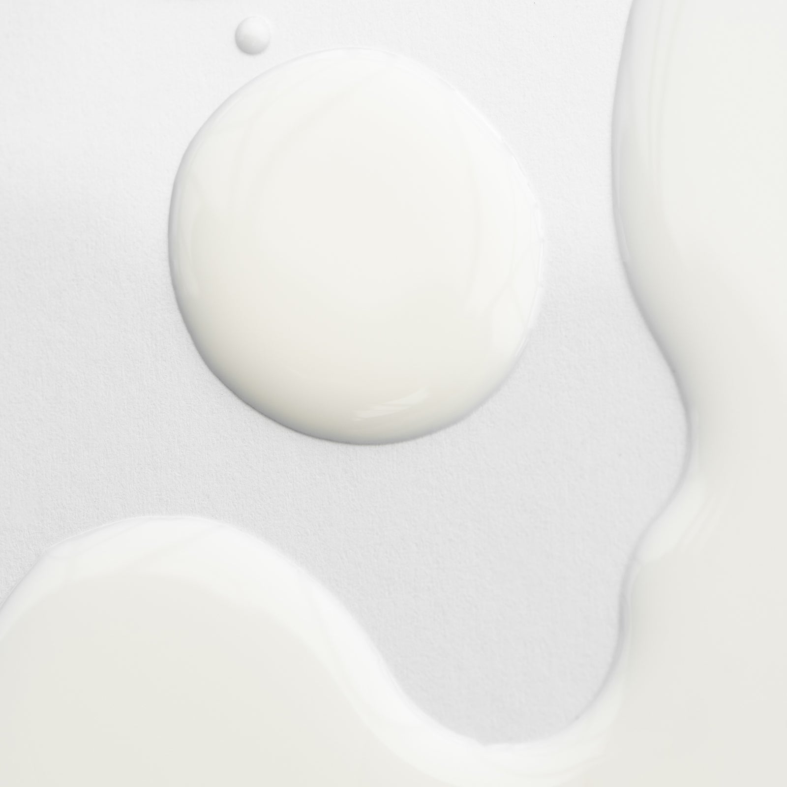 Texture of Marie Veronique's NEW Body Barrier Emulsion 4 oz - Moisture Reimagined. Barrier layer body support to BOOST CERAMIDES, PROTECT WITH PROBIOTICS + PROVIDE EXCEPTIONAL HYDRATION for total skin health with age-delay benefits.