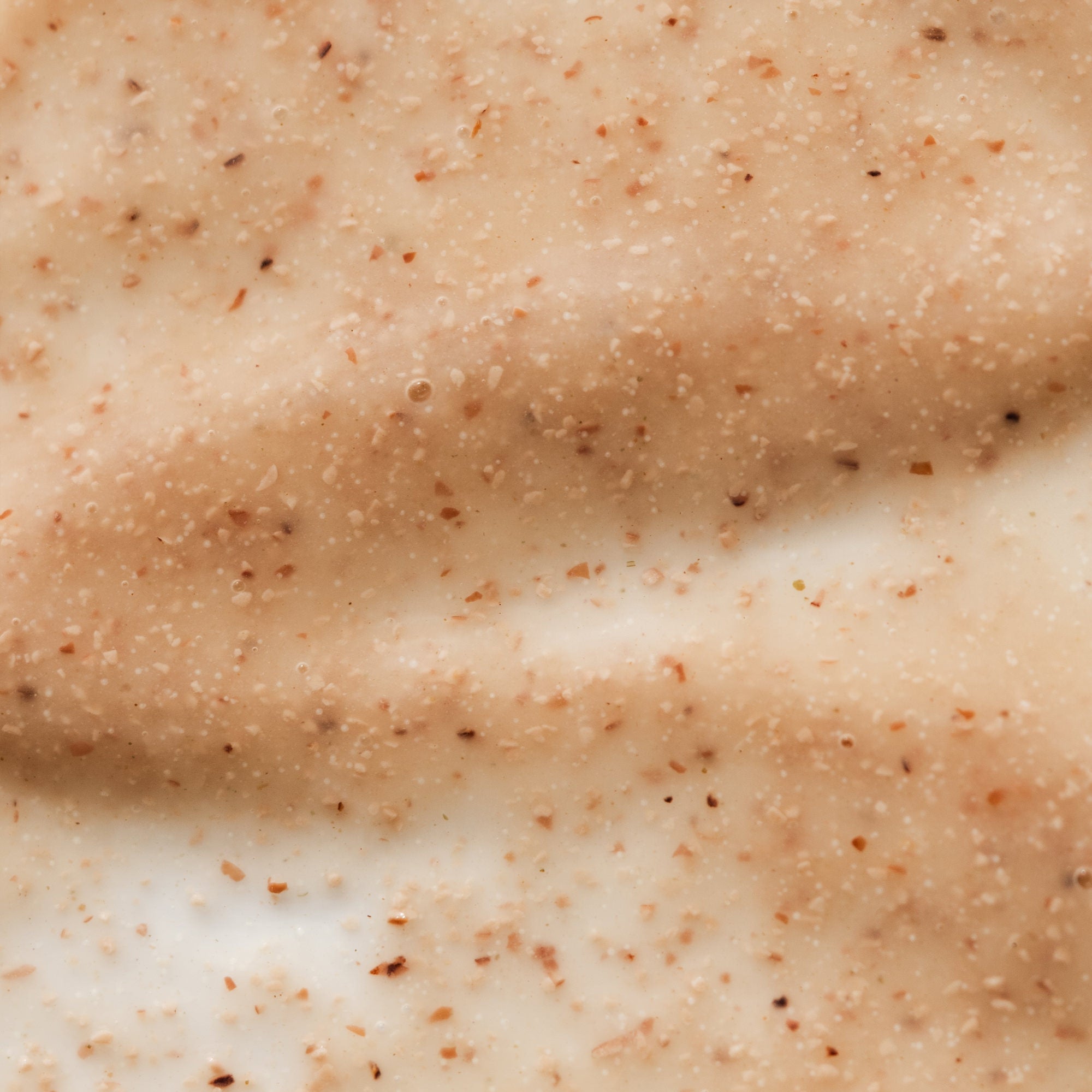 Texture of Marie Veronique Daily Exfoliating Cleanser 4 fl oz / 118 ml. A gentle cleanser formulated with alpha and beta hydroxy acids and adzuki bean powder for dissolving and removing dead skin cells without risk of microtears.